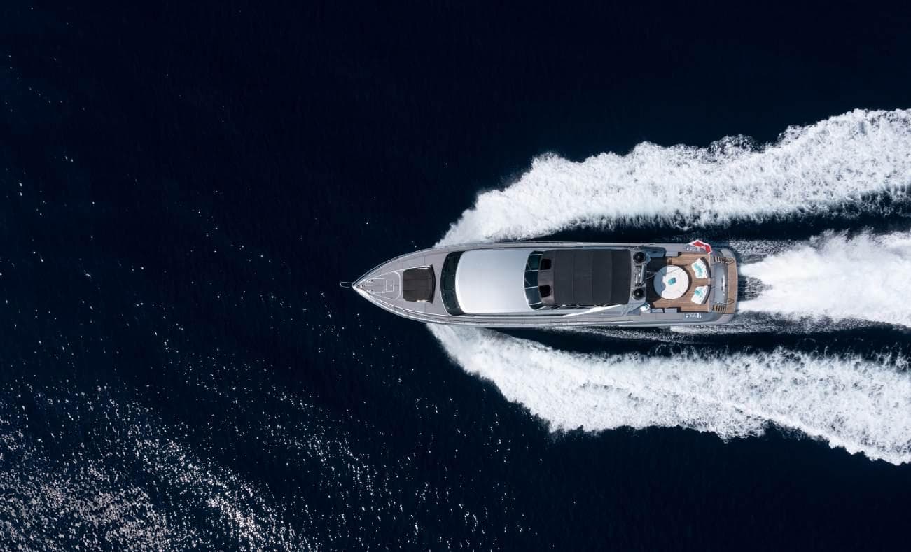 Aerial overhead view of a superyacht cruising the Riviera